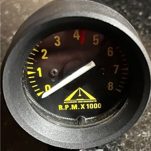 Black RPM Gauge with Yellow Markings